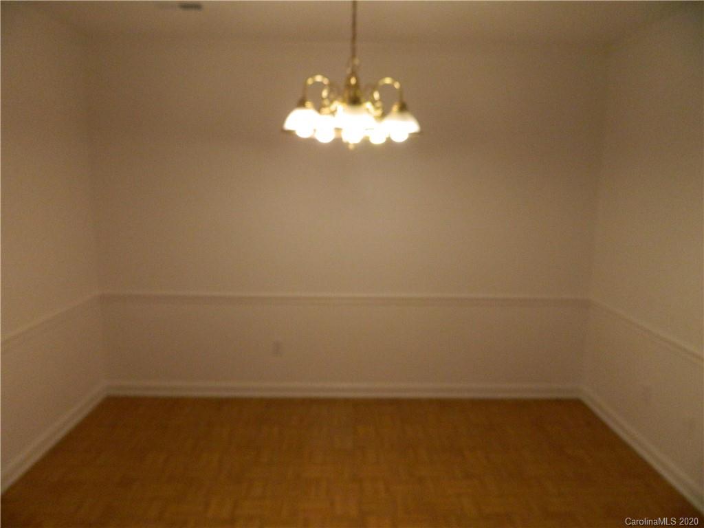 5718 Trotters Ridge Road Charlotte, NC 28227 - Photo 5 of 18 a view of a room with window and tiles