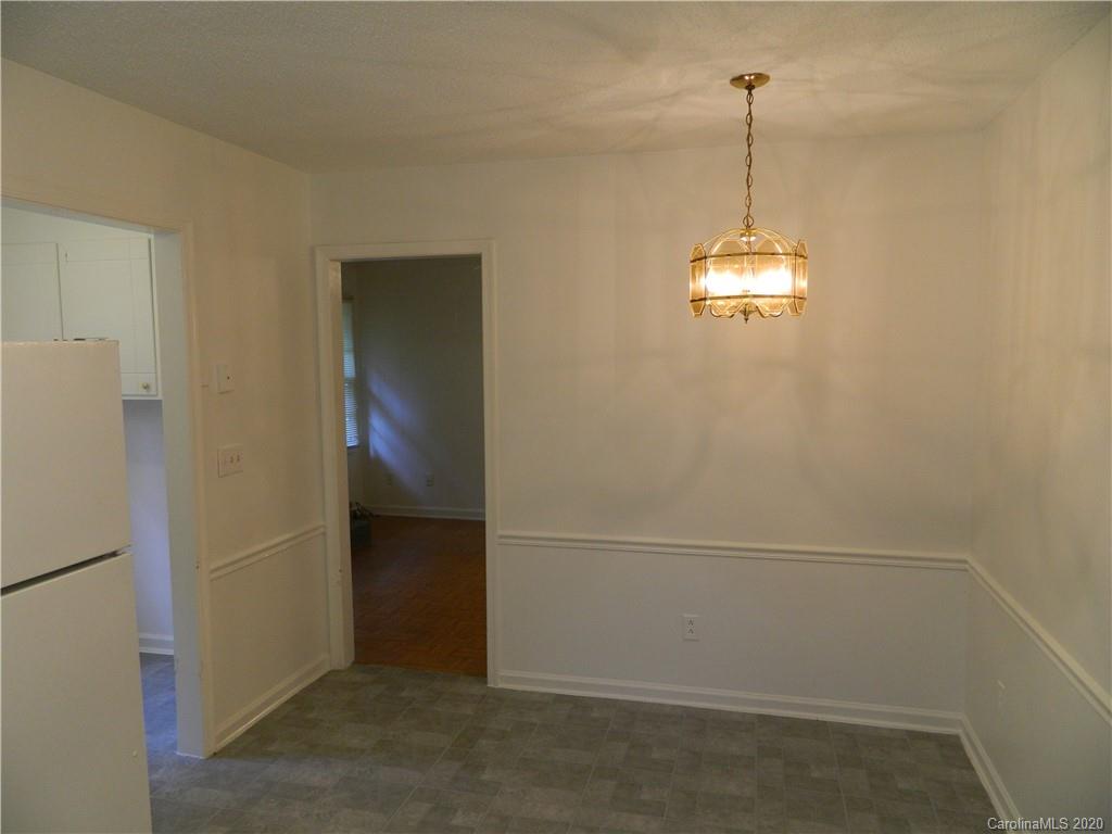 5718 Trotters Ridge Road Charlotte, NC 28227 - Photo 6 of 18 a view of empty room with windows