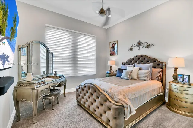 a utility room with dryer washer and a window