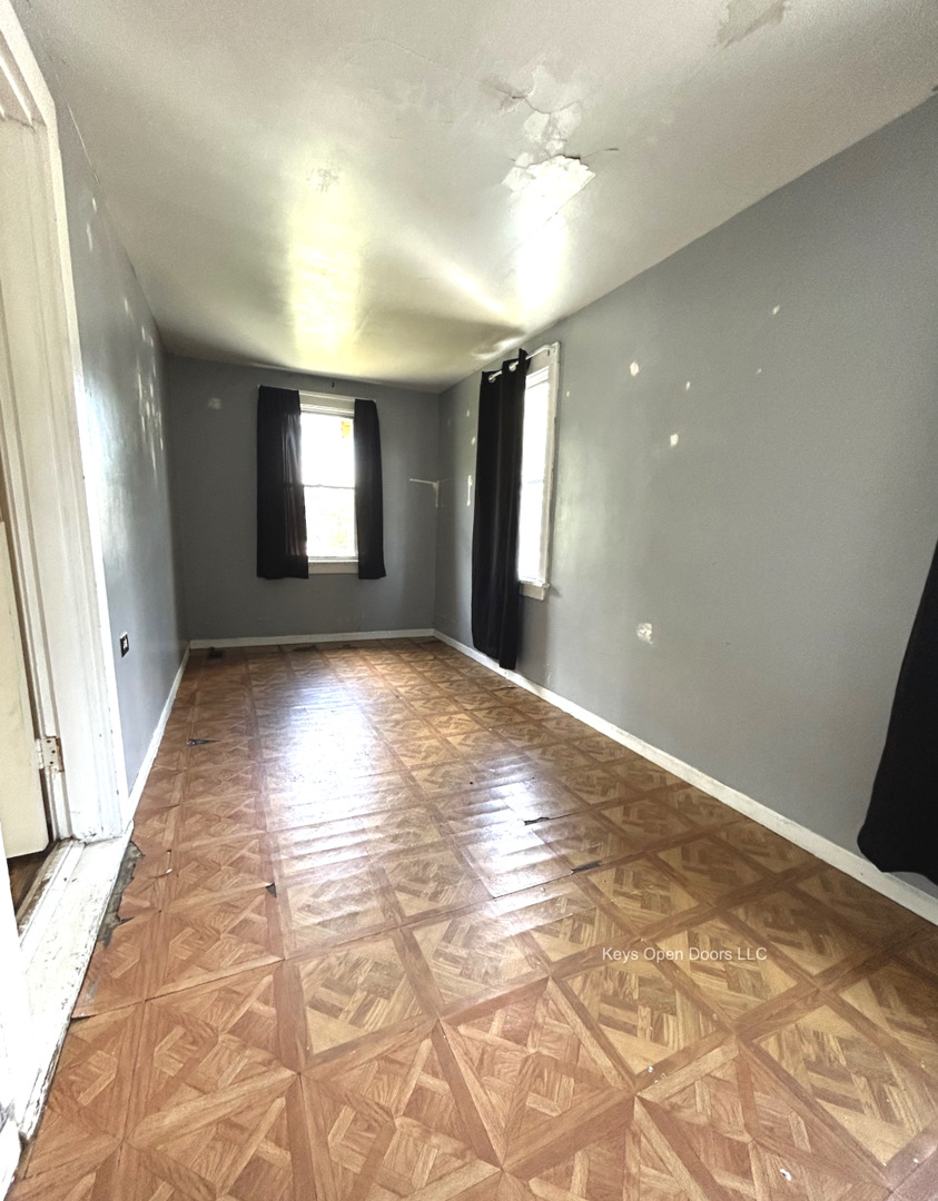 509 Fifth Street Aurora, IL 60505 - Photo 14 of 14 a view of empty room with window