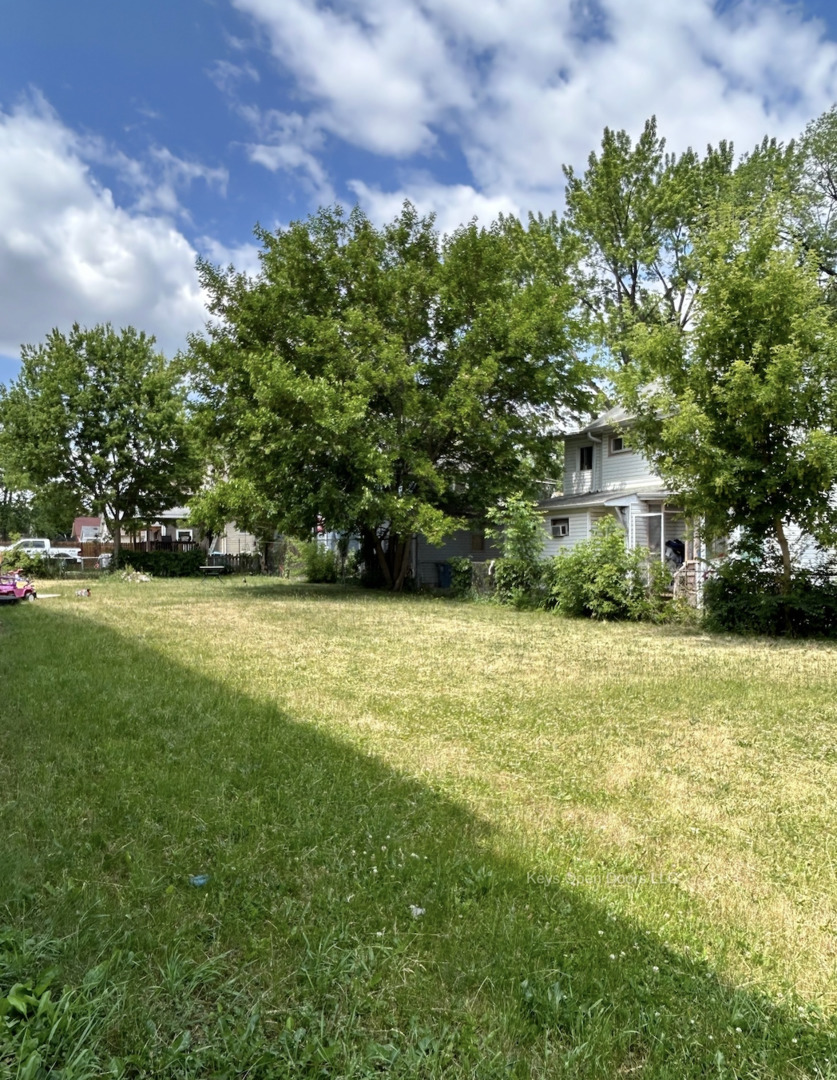 509 Fifth Street Aurora, IL 60505 - Photo 2 of 14 a view of a yard with a house