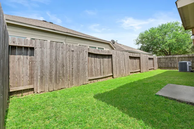 a view of a back yard of the house