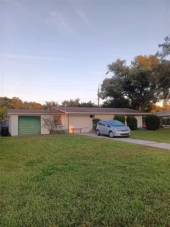 a house view with a garden space