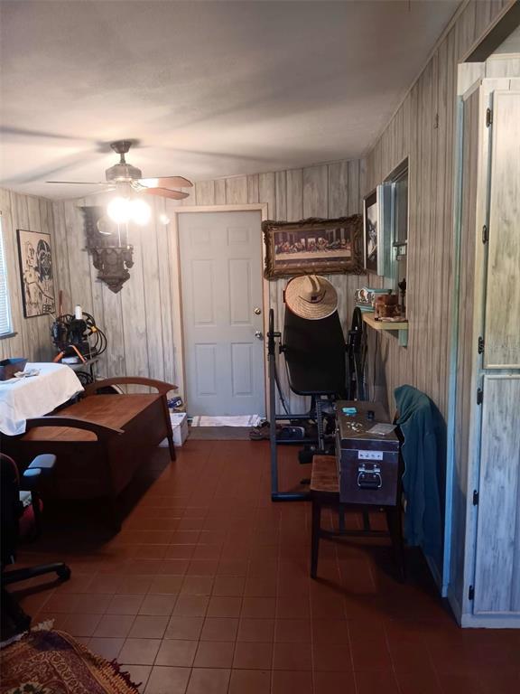 4245 Edgewater Drive Orlando, FL 32804 - Photo 13 of 44 a bedroom with a bed and a mirror