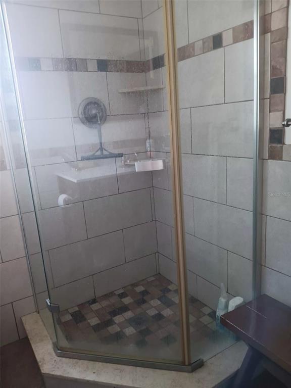 4245 Edgewater Drive Orlando, FL 32804 - Photo 34 of 44 a bathroom with a shower