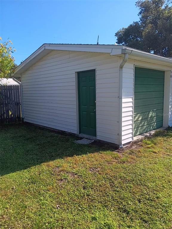 4245 Edgewater Drive Orlando, FL 32804 - Photo 44 of 44 a view of a backyard of the house