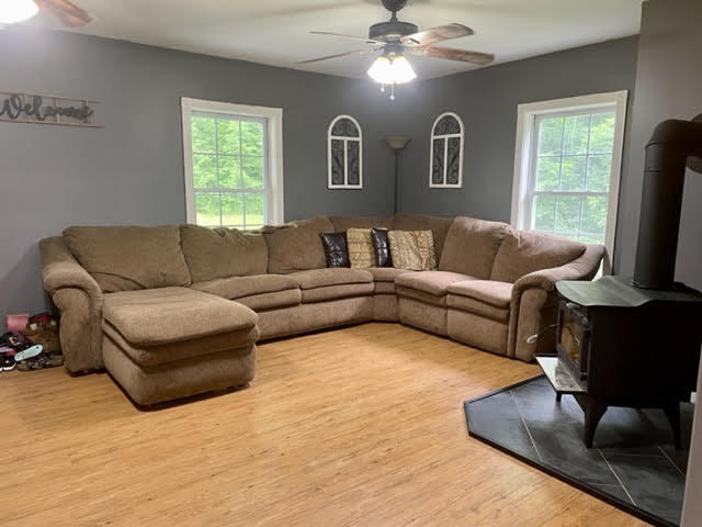 160 Lancaster Road Canaan, ME 04924 - Photo 4 of 46 Living room with wood stove