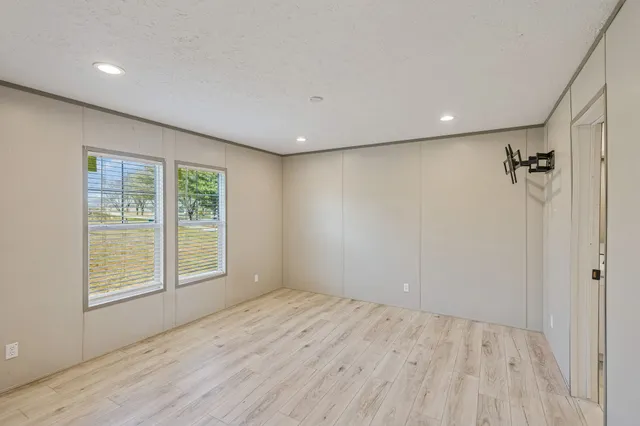 a bathroom with 2 sink and a mirror
