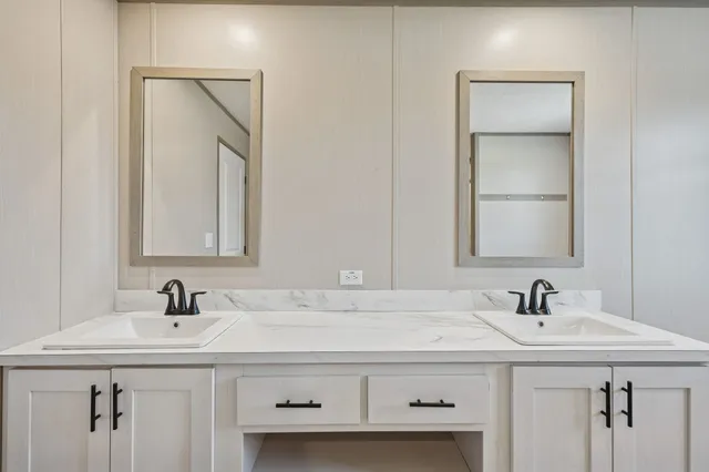 a bathroom with a shower and a bath tub