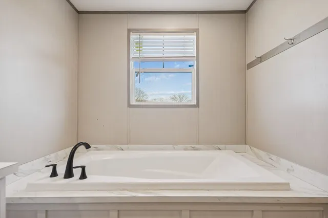 a view of outside space with swimming pool and mountains in the background