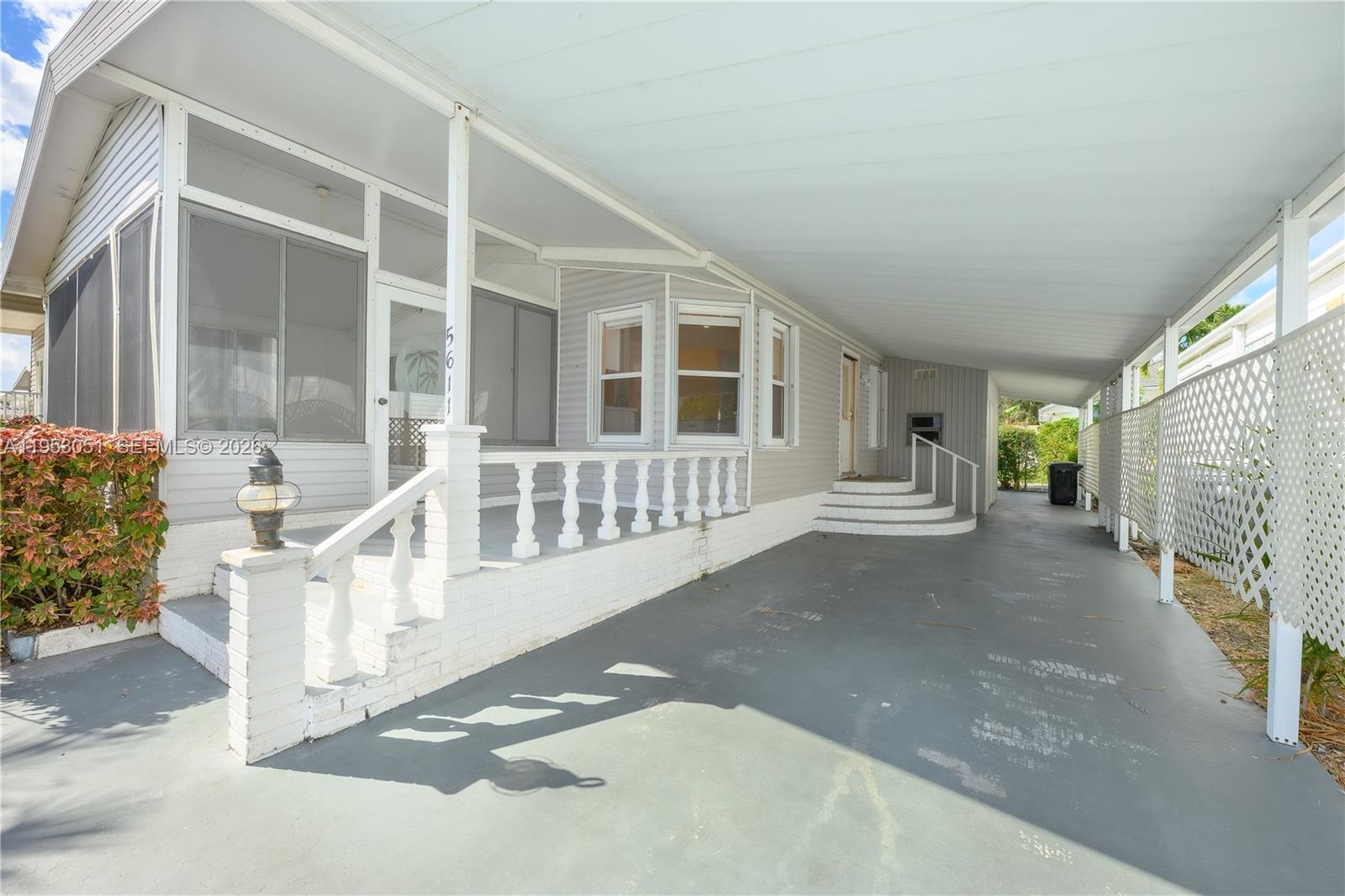 5611 Southwest 32nd Terrace Dania Beach, FL 33312 - Photo 24 of 29 a view of a house with a street