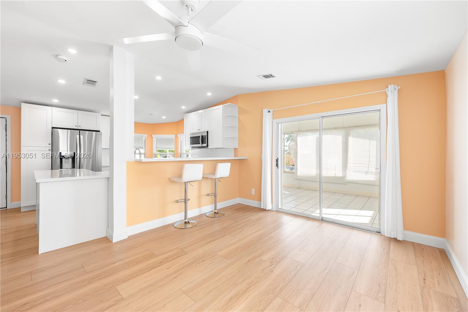 5611 Southwest 32nd Terrace Dania Beach, FL 33312 - Photo 7 of 29 a view of a kitchen with wooden floor and a kitchen