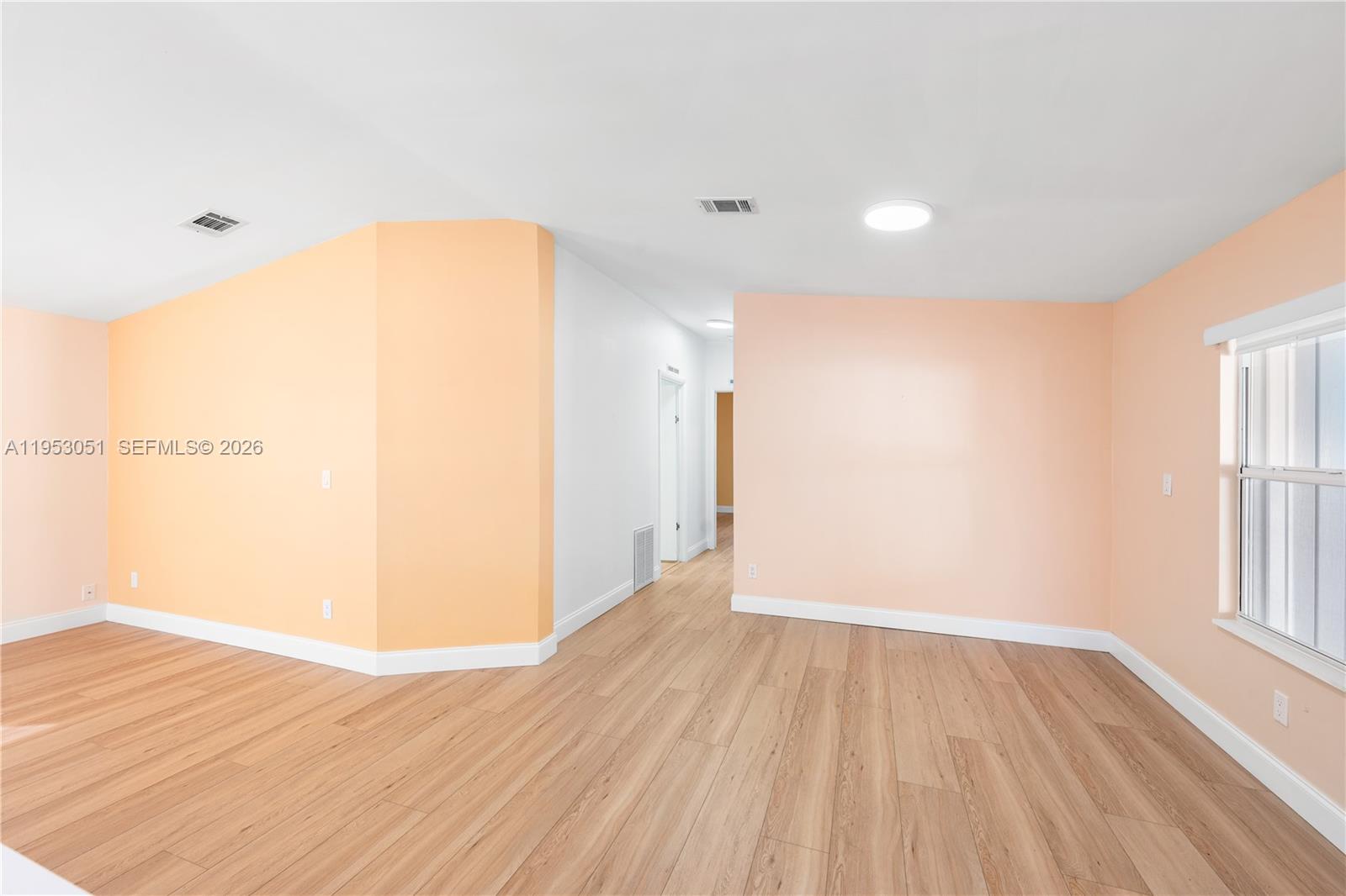 5611 Southwest 32nd Terrace Dania Beach, FL 33312 - Photo 9 of 29 a view of a room with wooden floor