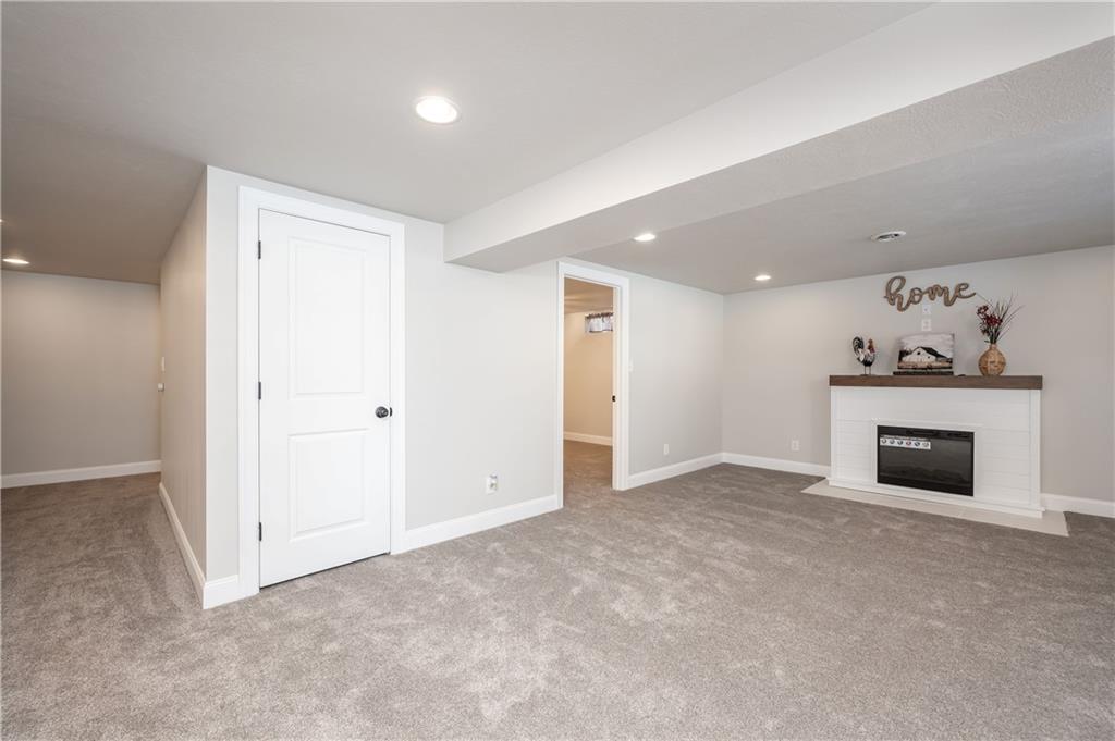 146 Shannon Road Renfrew, PA 16053 - Photo 19 of 25 an empty room with a fireplace