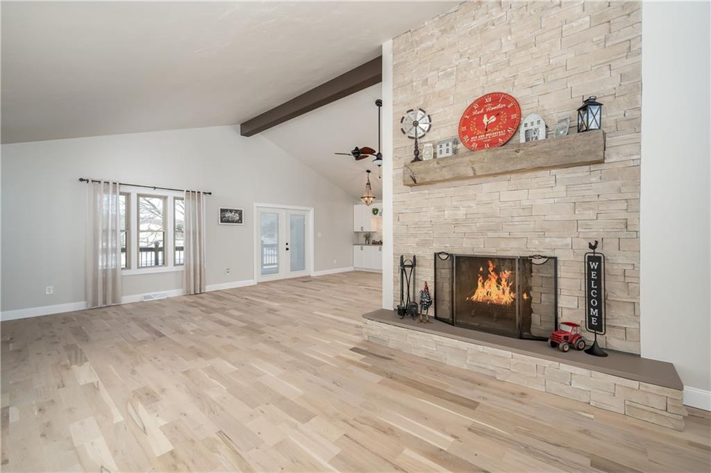 146 Shannon Road Renfrew, PA 16053 - Photo 4 of 25 a view of an empty room with wooden floor and a fireplace