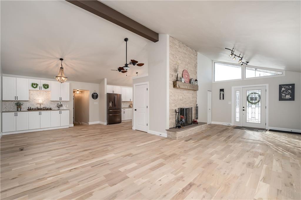 146 Shannon Road Renfrew, PA 16053 - Photo 5 of 25 a view of a kitchen with a sink and a fireplace