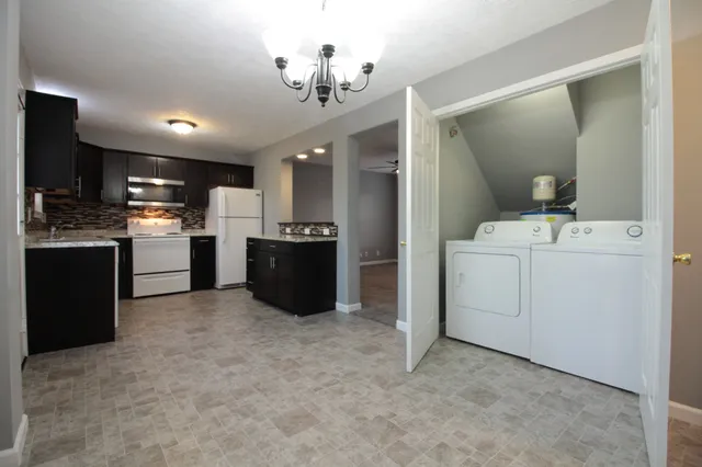 a view of a kitchen with a sink