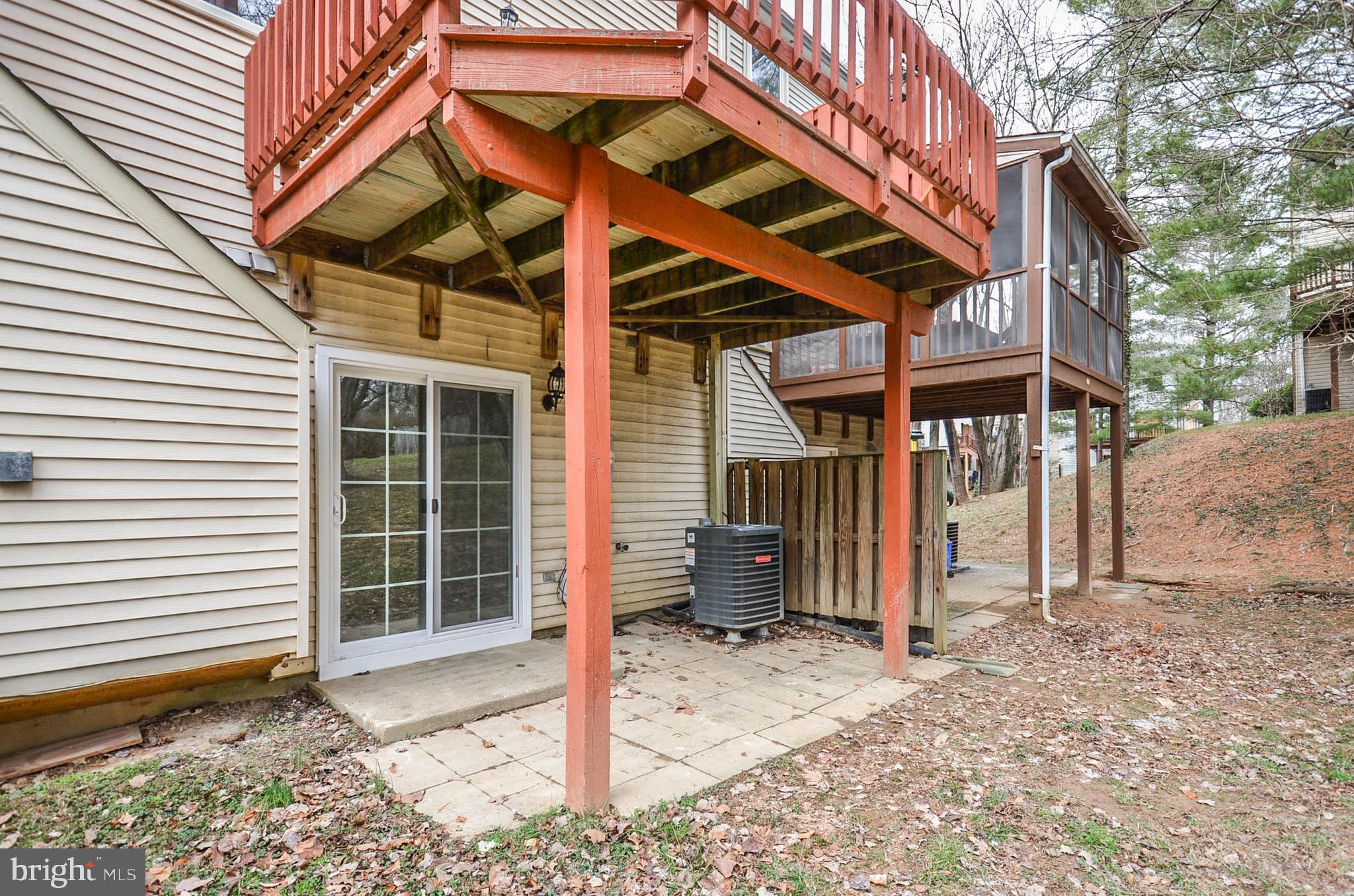 19 Sonata Court Silver Spring, MD 20901 - Photo 30 of 32 Patio under deck off basement doors.