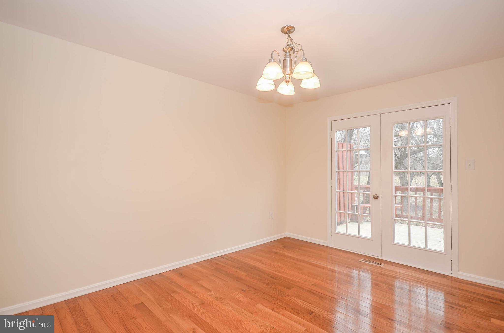 Dining Room  w/ New HWF, and French doors to Deck!