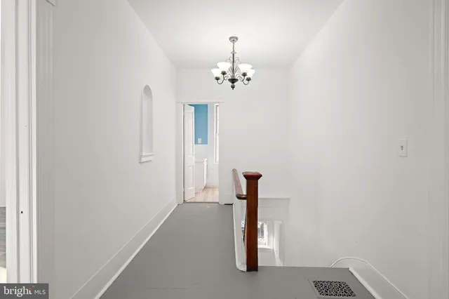 a view of an room with carpet