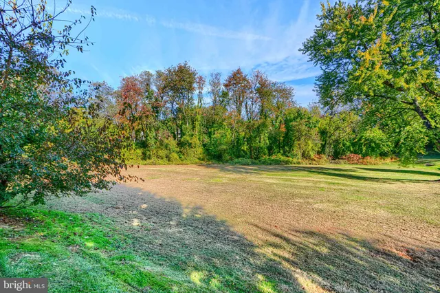 a view of deck with wooden floor and outdoor seating