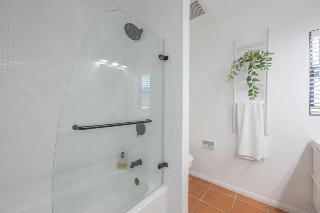 a view of a backyard with sitting area