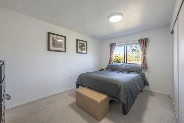 front view of a house with a garden