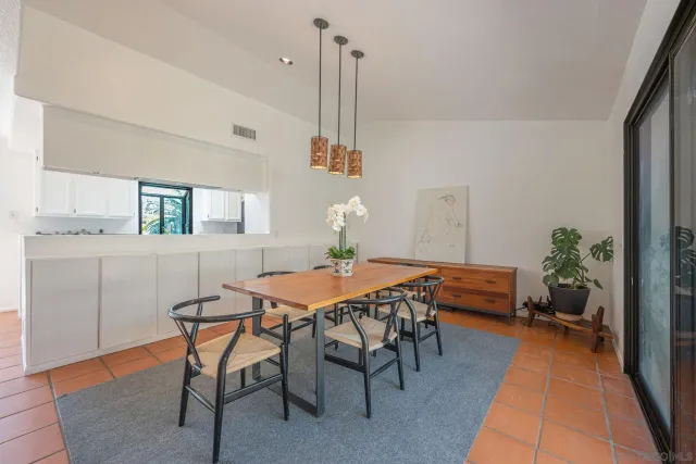 a big yard with lots of green space and deers