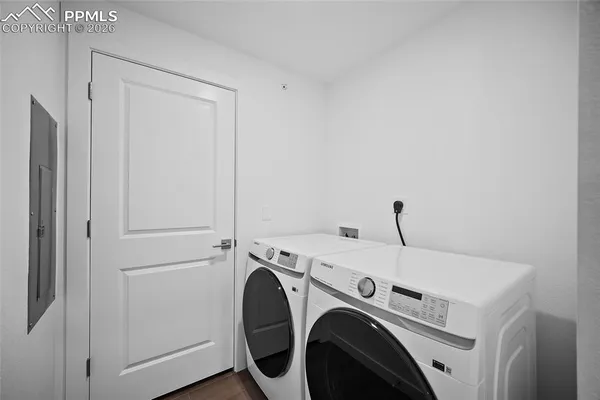 a utility room with dryer and washer