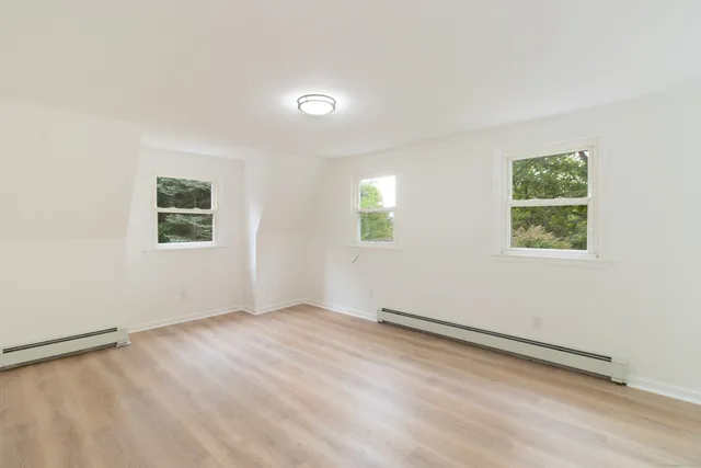 an empty room with windows