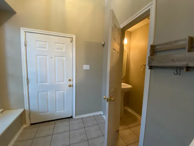 a view of a bathroom with front door