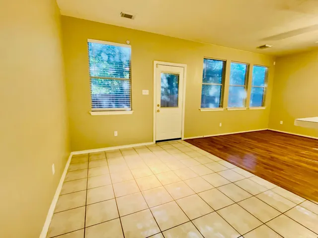 a view of an empty room and window