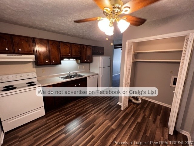 6211 Rannock Drive Fayetteville, NC 28304 - Photo 3 of 9 a kitchen with a refrigerator and a chandelier