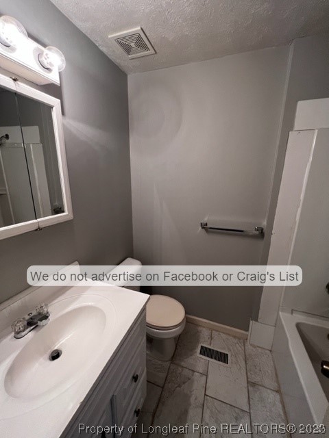 6211 Rannock Drive Fayetteville, NC 28304 - Photo 7 of 9 a bathroom with a granite countertop sink and a mirror