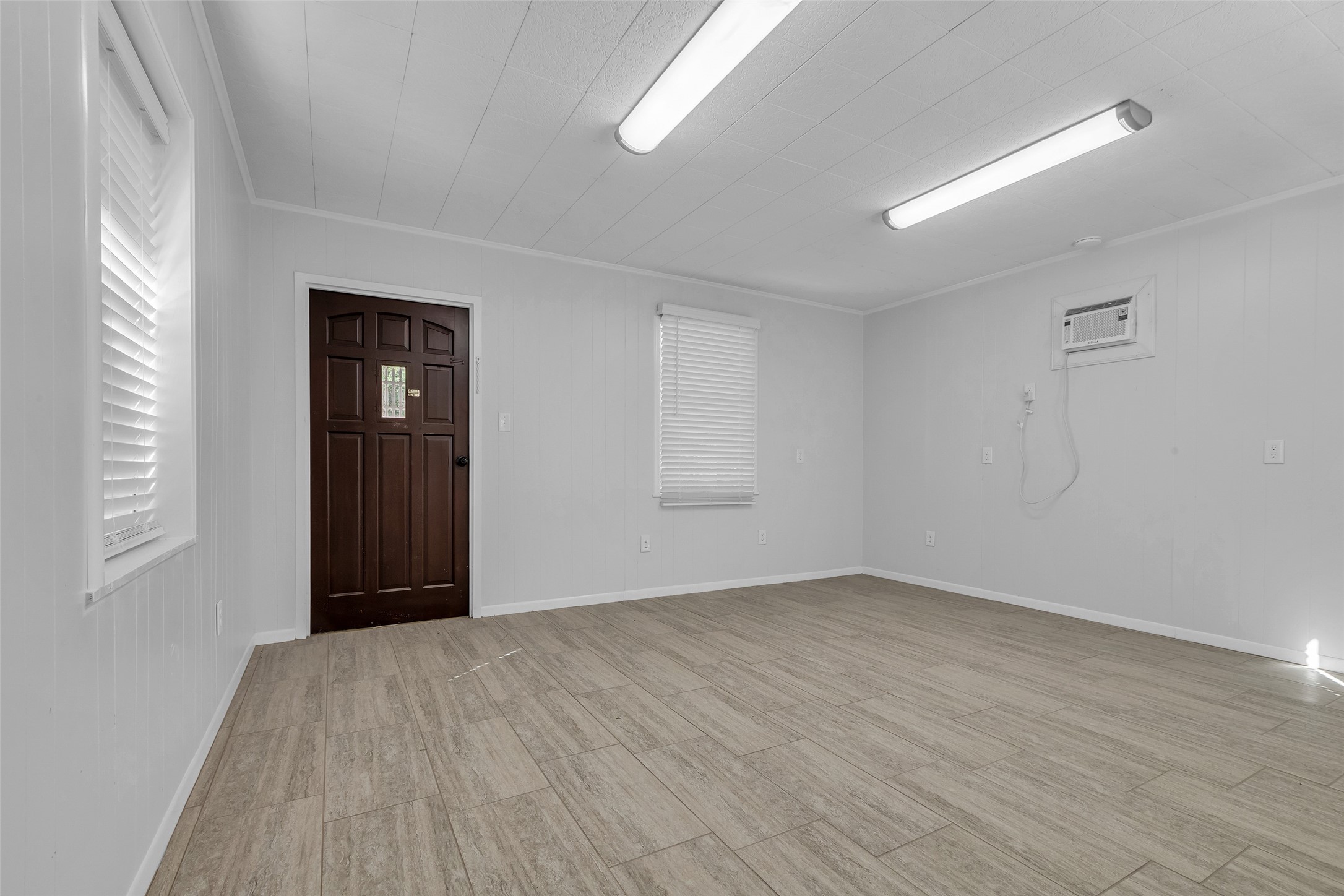 23311 Nichols Sawmill Road Hockley, TX 77447 - Photo 12 of 23 Even though the bonus room is attached to the primary suite, the door can be closed off for privacy while still having access through the private entrance.