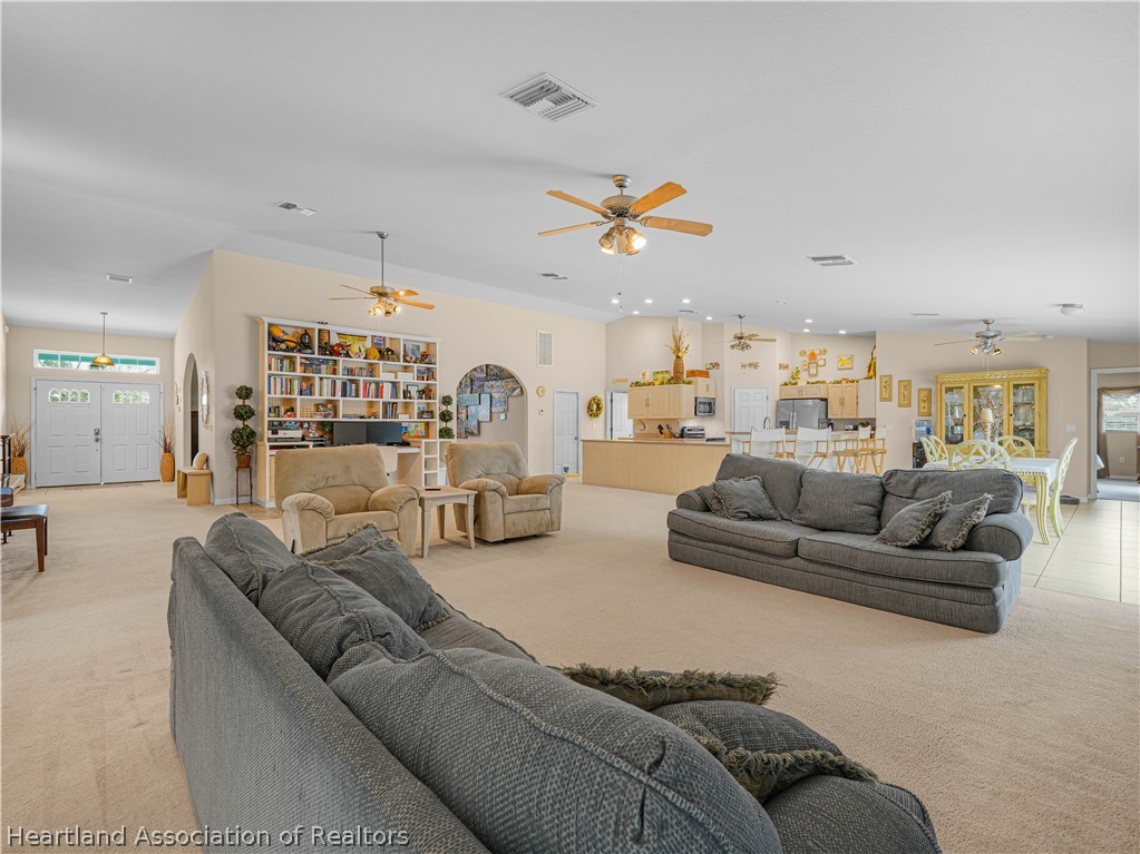 5721 Golden Road Sebring, FL 33875 - Photo 3 of 42 View toward kitchen, breakfast bar and breakfast nook