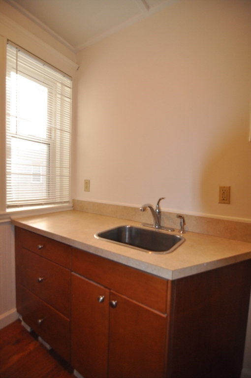 131 Park Drive, Unit 11 Boston, MA 02215 - Photo 6 of 15 a kitchen with a sink and cabinets