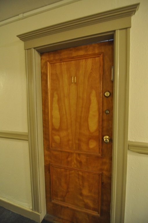 131 Park Drive, Unit 11 Boston, MA 02215 - Photo 8 of 15 a bathroom with a glass door