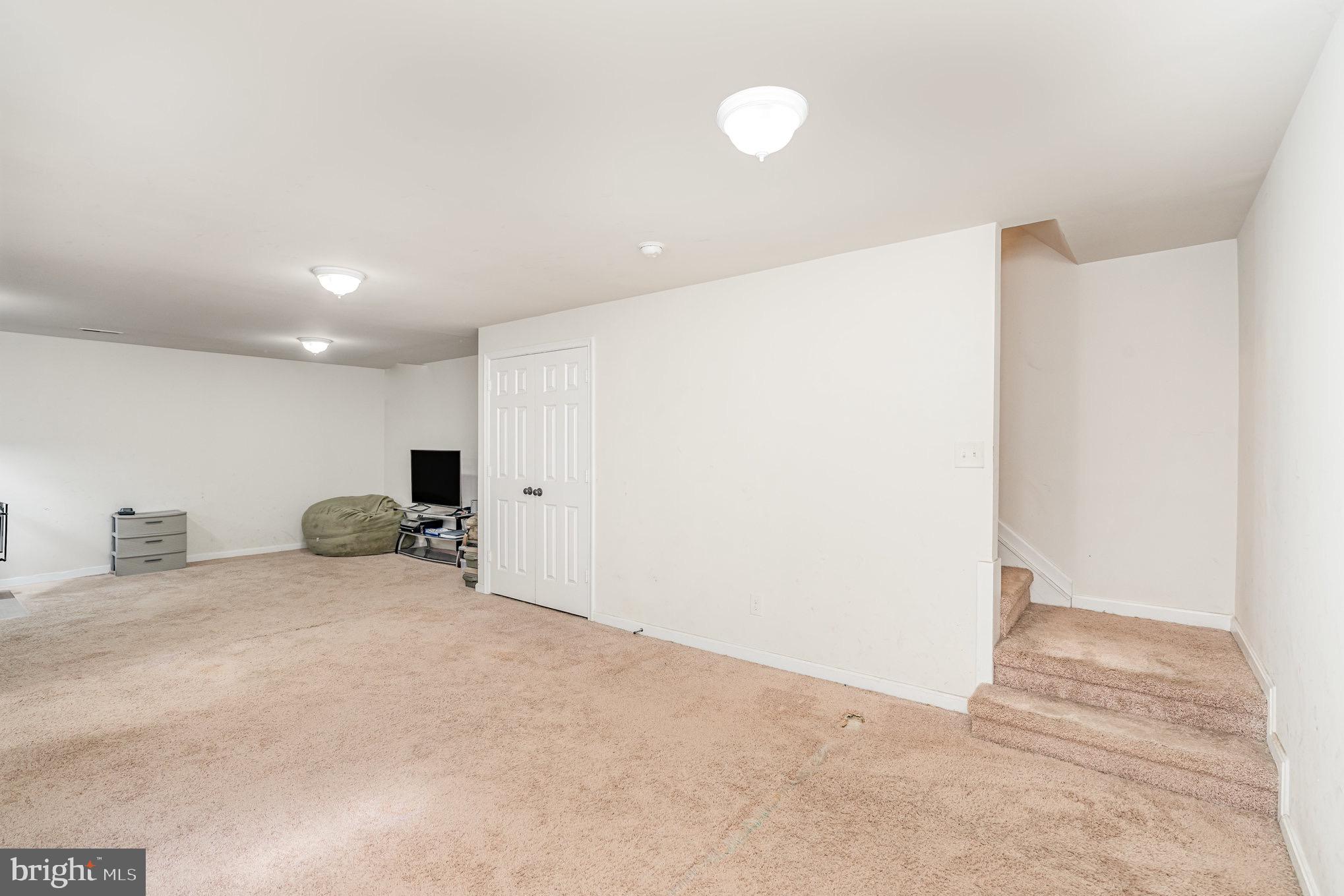 205 Powhatan Court, Unit 100 Stafford, VA 22556 - Photo 20 of 23 a view of a room with a large window