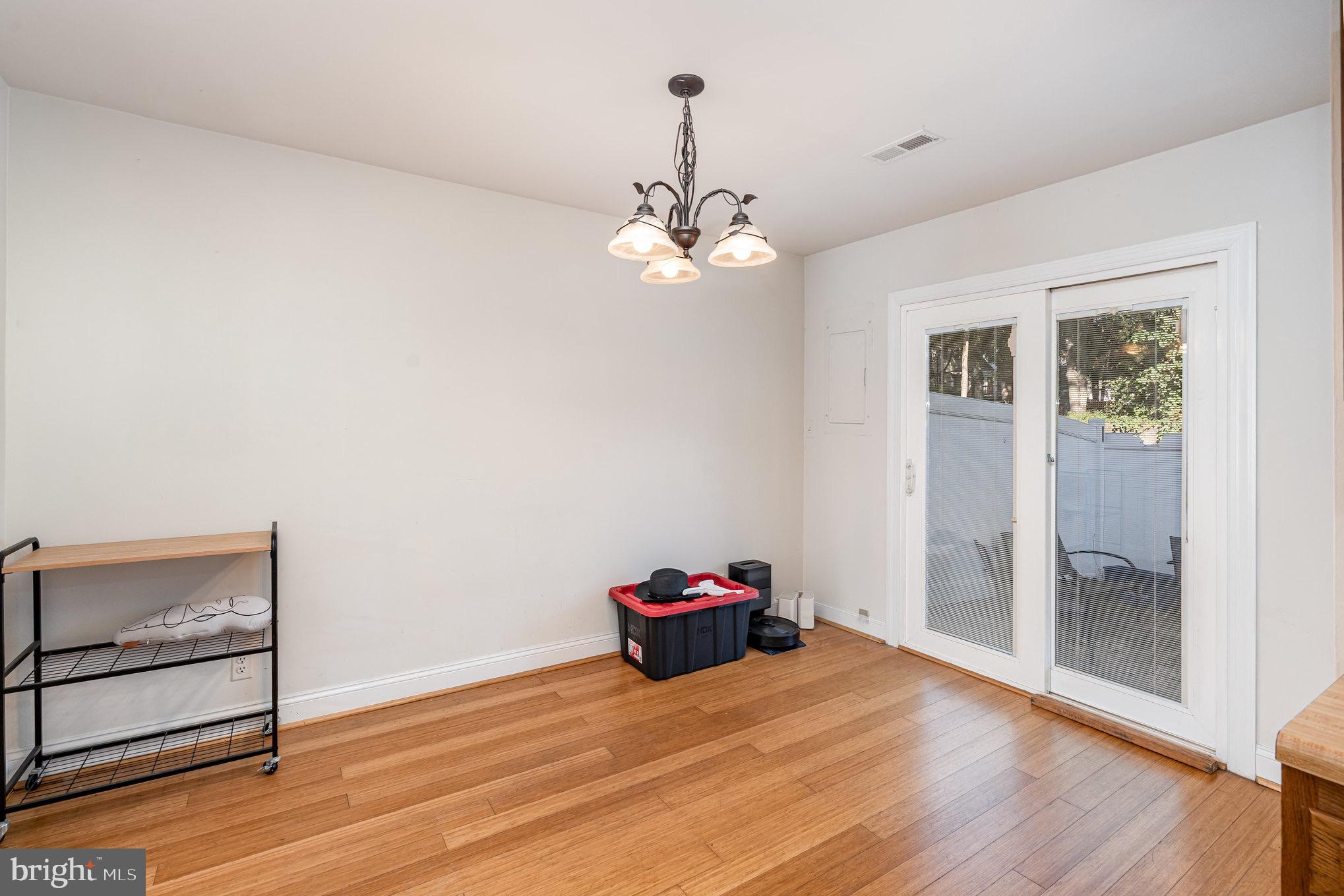 205 Powhatan Court, Unit 100 Stafford, VA 22556 - Photo 10 of 23 a living room with hard wood floors