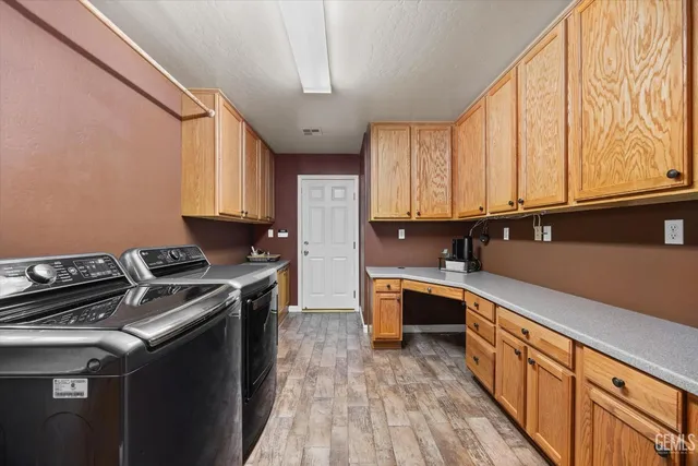 a view of a porch with furniture and a yard
