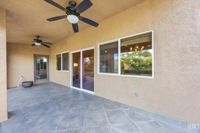 a view of a porch with seating space
