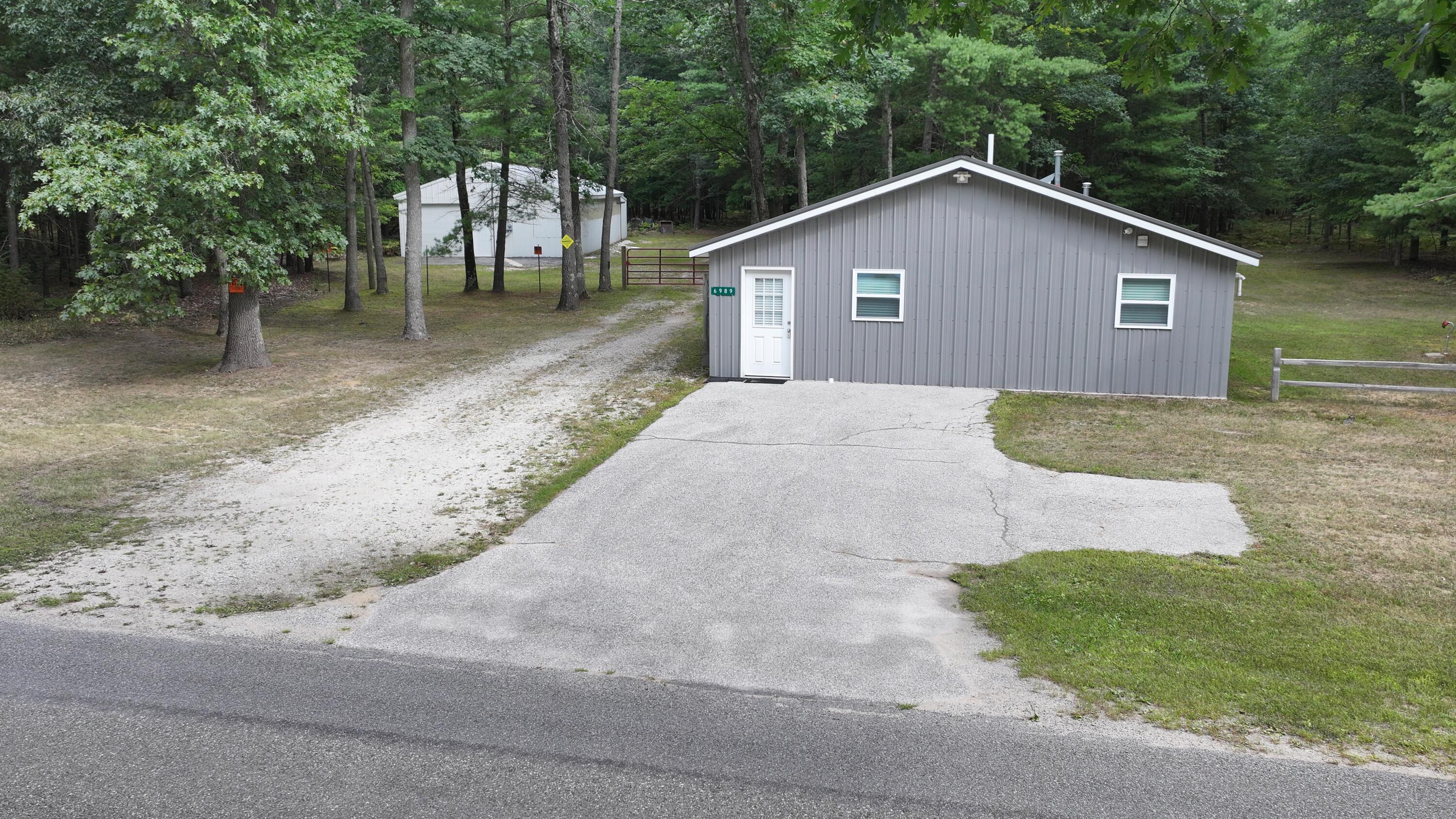 9232 West 7 Mile Road Irons, MI 49644 - Photo 26 of 28 DJI_20260729175601_0494_D