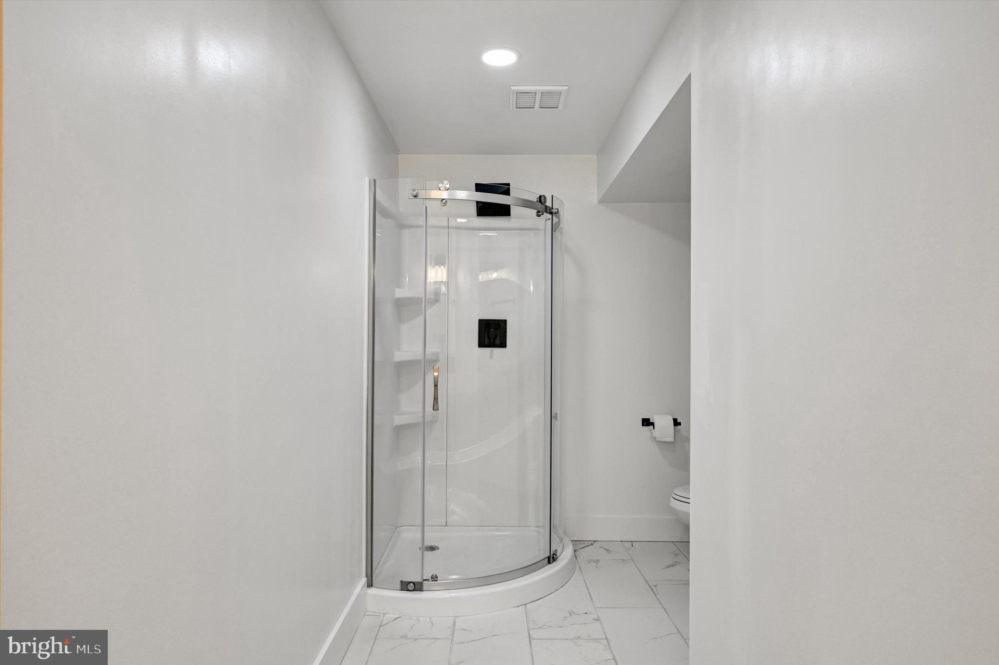 2806 Foxhound Road Ellicott City, MD 21042 - Photo 40 of 55 a bathroom with a shower