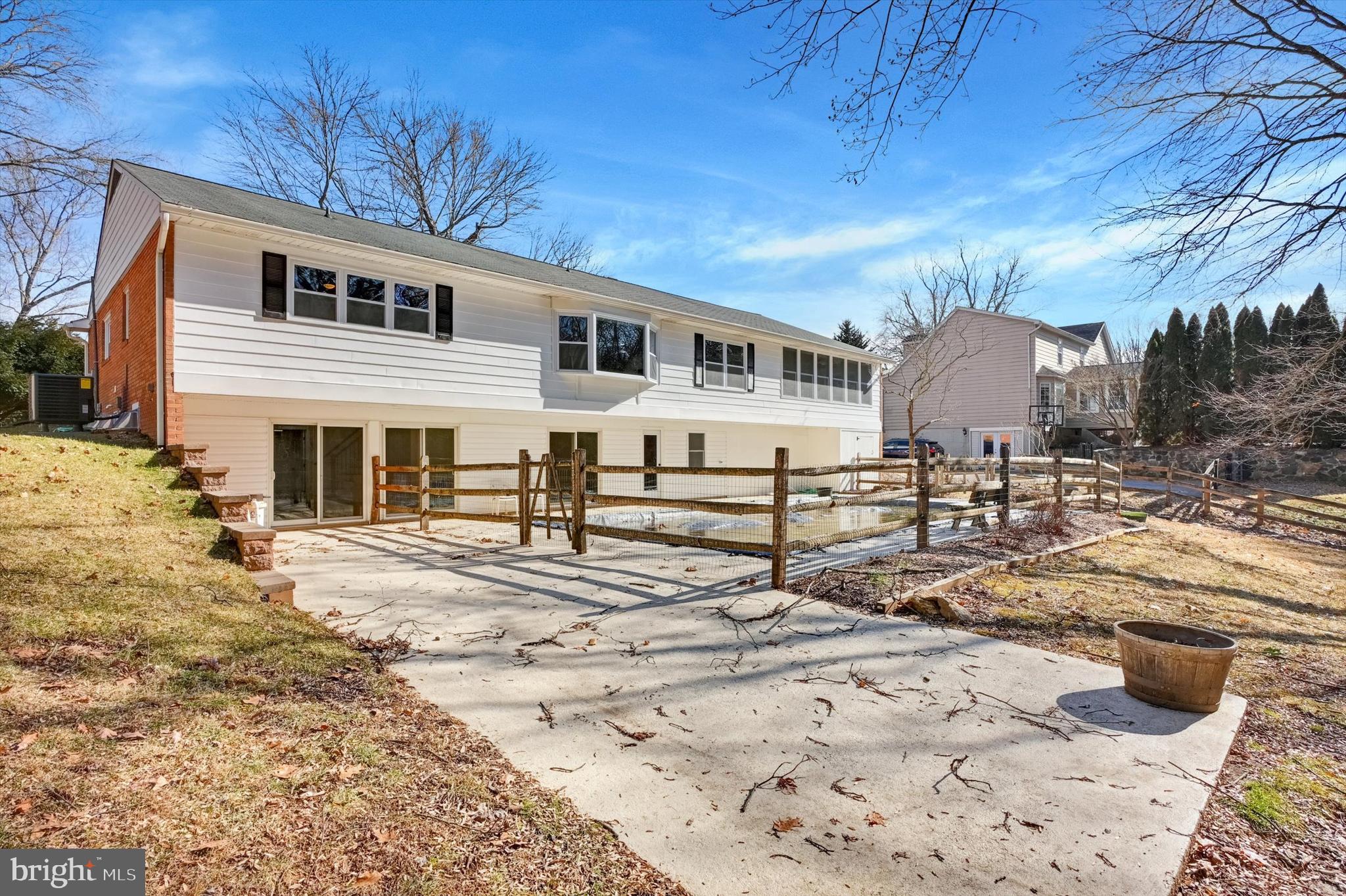 2806 Foxhound Road Ellicott City, MD 21042 - Photo 50 of 55 a front view of a house with a yard