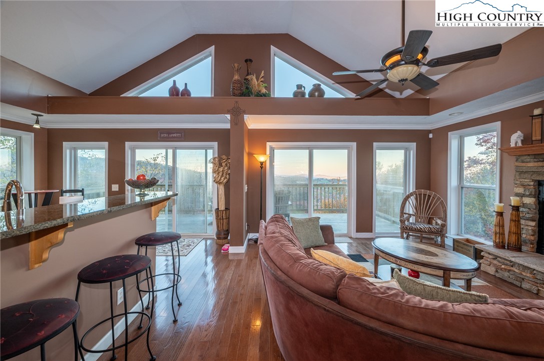 309 Pinnacle Ridge Road Beech Mountain, NC 28604 - Photo 13 of 45 a living room with furniture and large windows