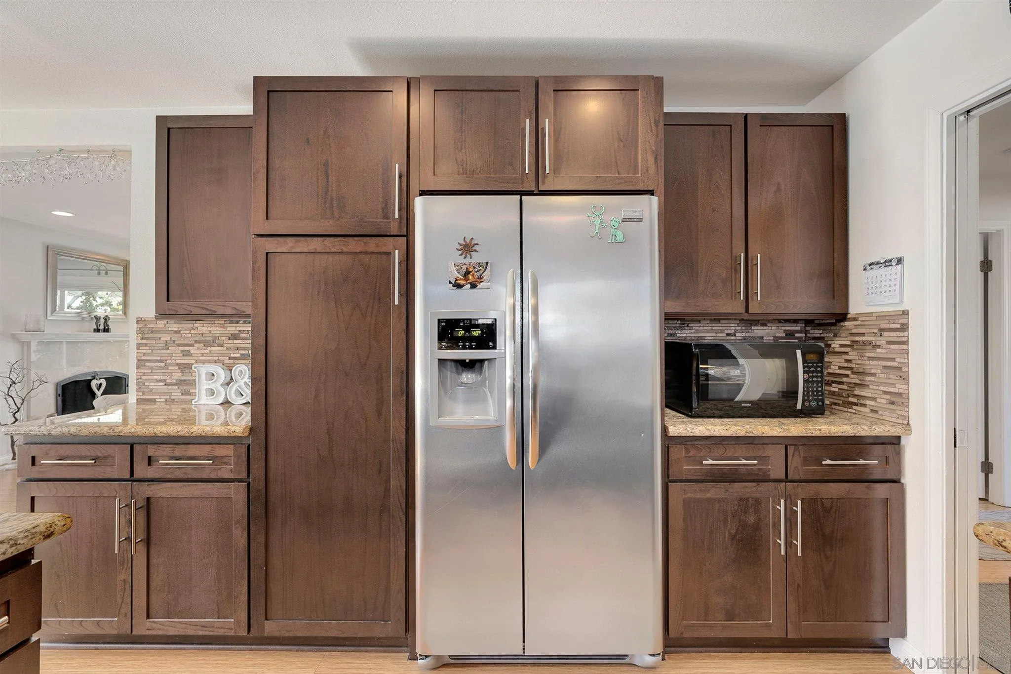 13716 Frame Road Poway, CA 92064 - Photo 12 of 34 a kitchen with stainless steel appliances granite countertop a refrigerator and a stove