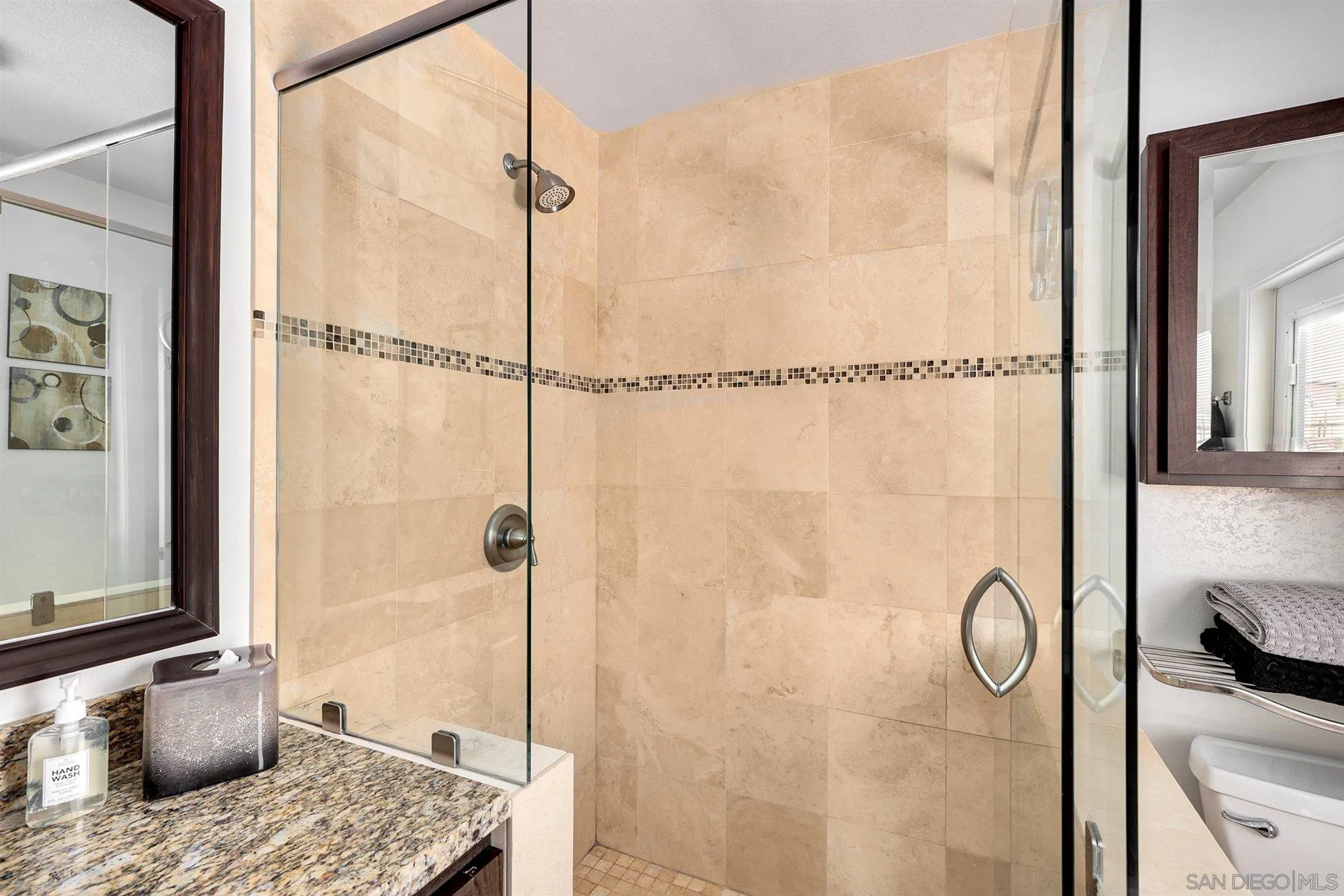 13716 Frame Road Poway, CA 92064 - Photo 23 of 34 a bathroom with a granite countertop shower and a sink