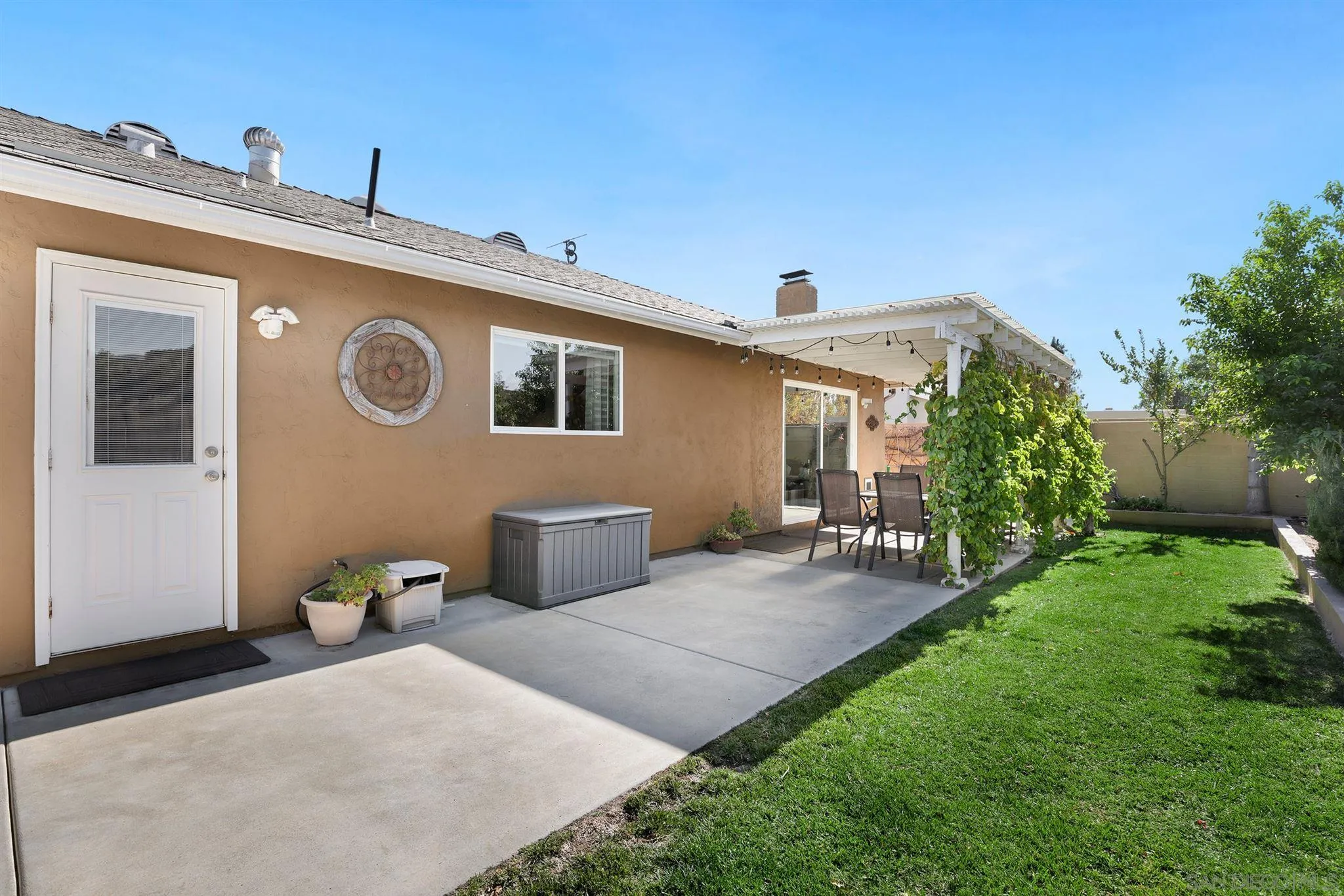 13716 Frame Road Poway, CA 92064 - Photo 26 of 34 a view of a house with backyard and sitting area