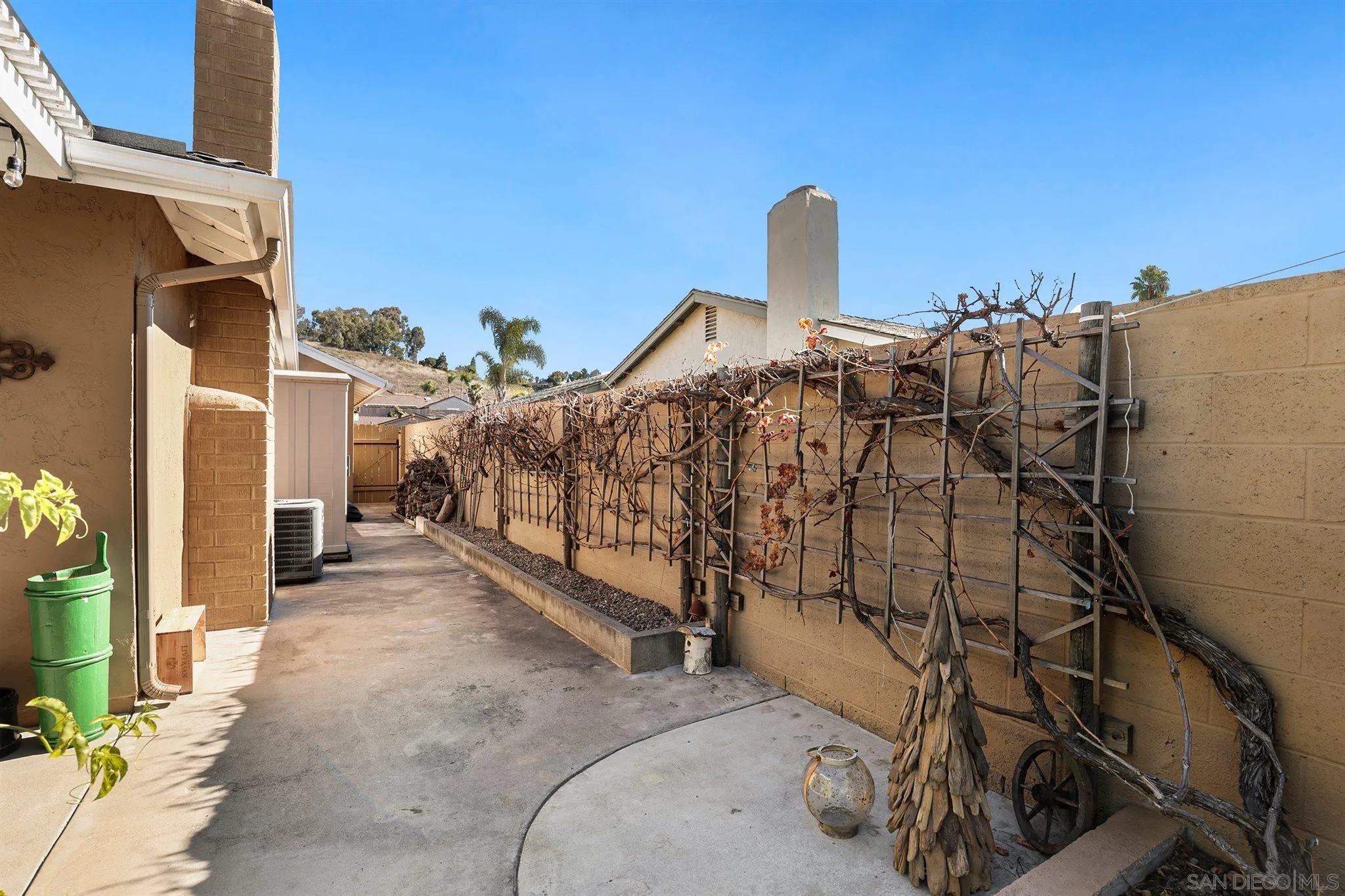 13716 Frame Road Poway, CA 92064 - Photo 29 of 34 a view of a house with basketball court
